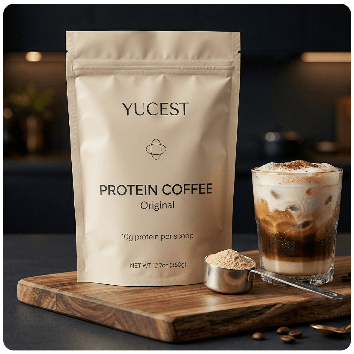 A glass of iced Yucest protein coffee beside the pouch on a wooden board